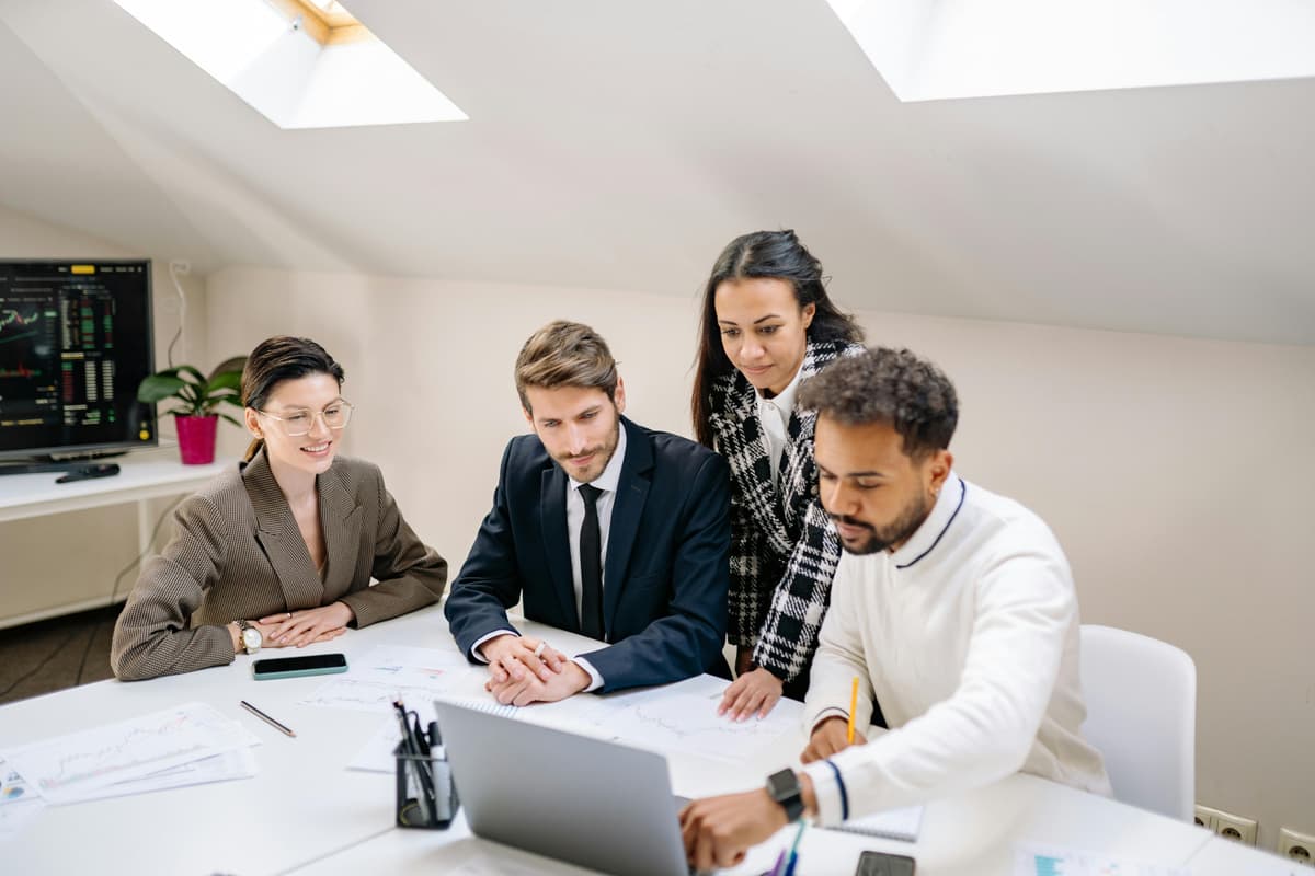 Modern office space with team members collaborating